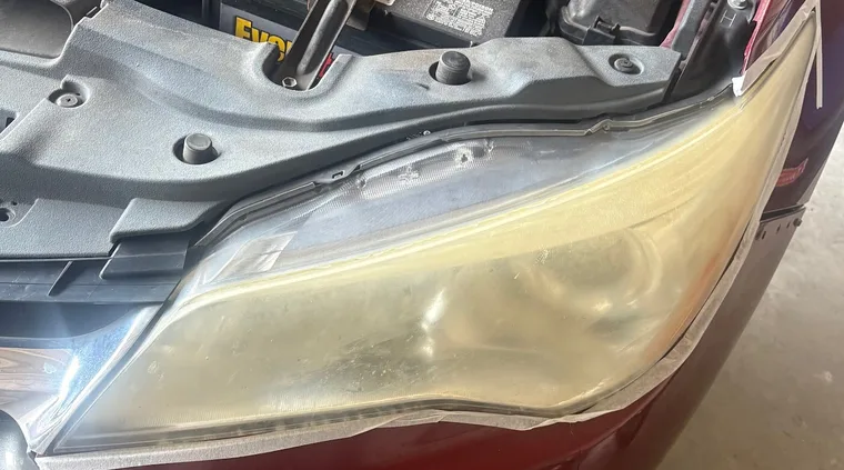 Headlight before restoration: cloudy and yellowed